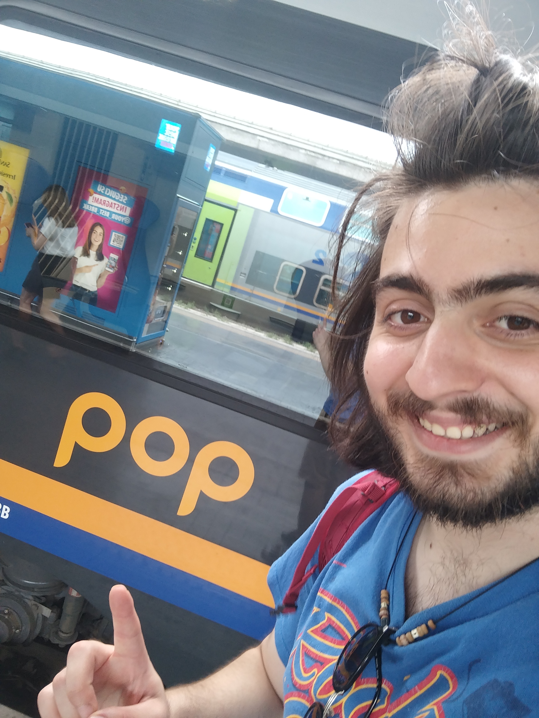 me and a Pop train logo behind me