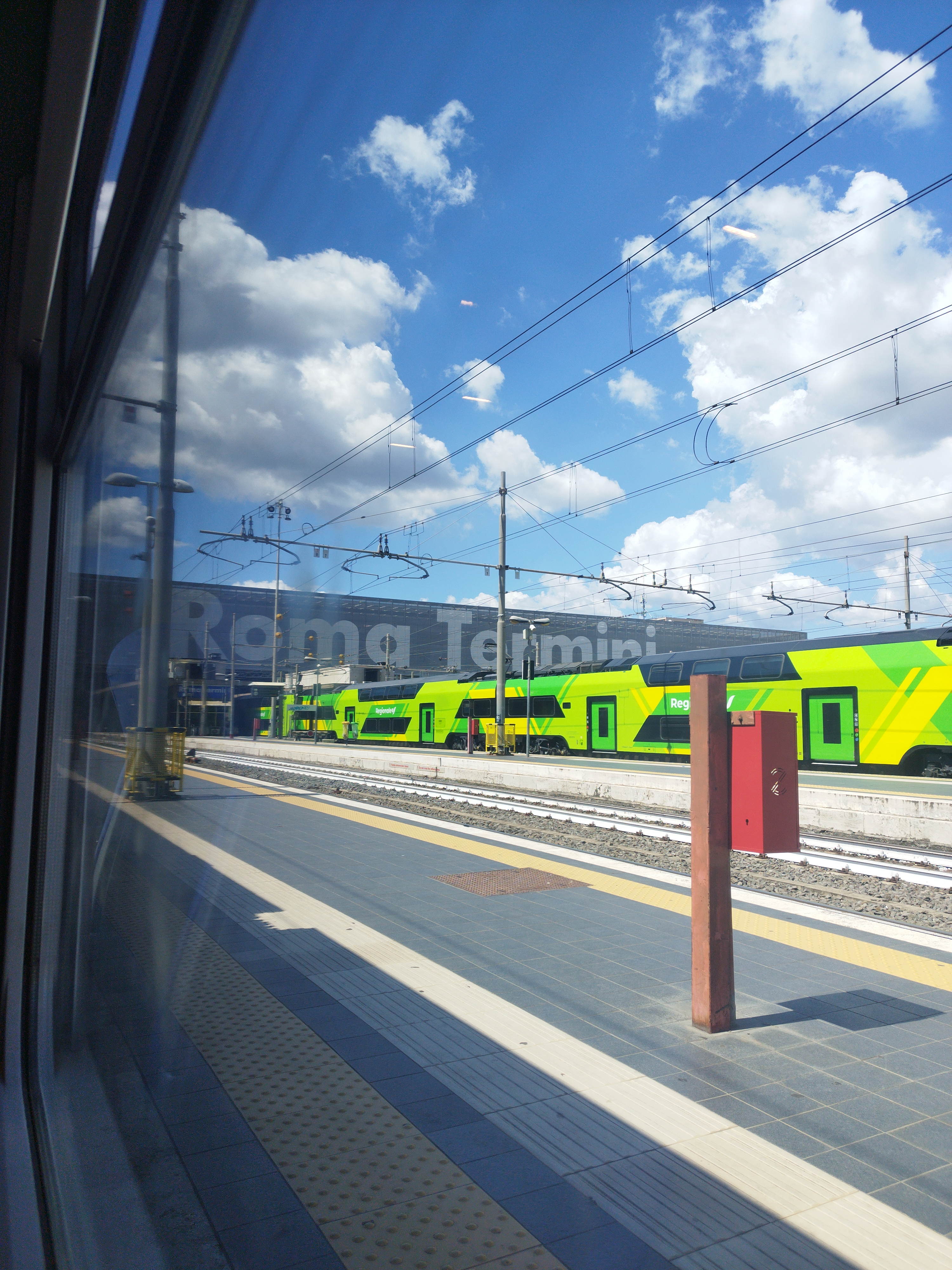 Green train from afar